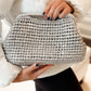 THE METALLIC CLUTCH